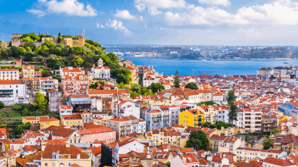 Panoramic view of Lisbon with colorful rooftops and the Tagus River, an Ideal to your nonprofit events